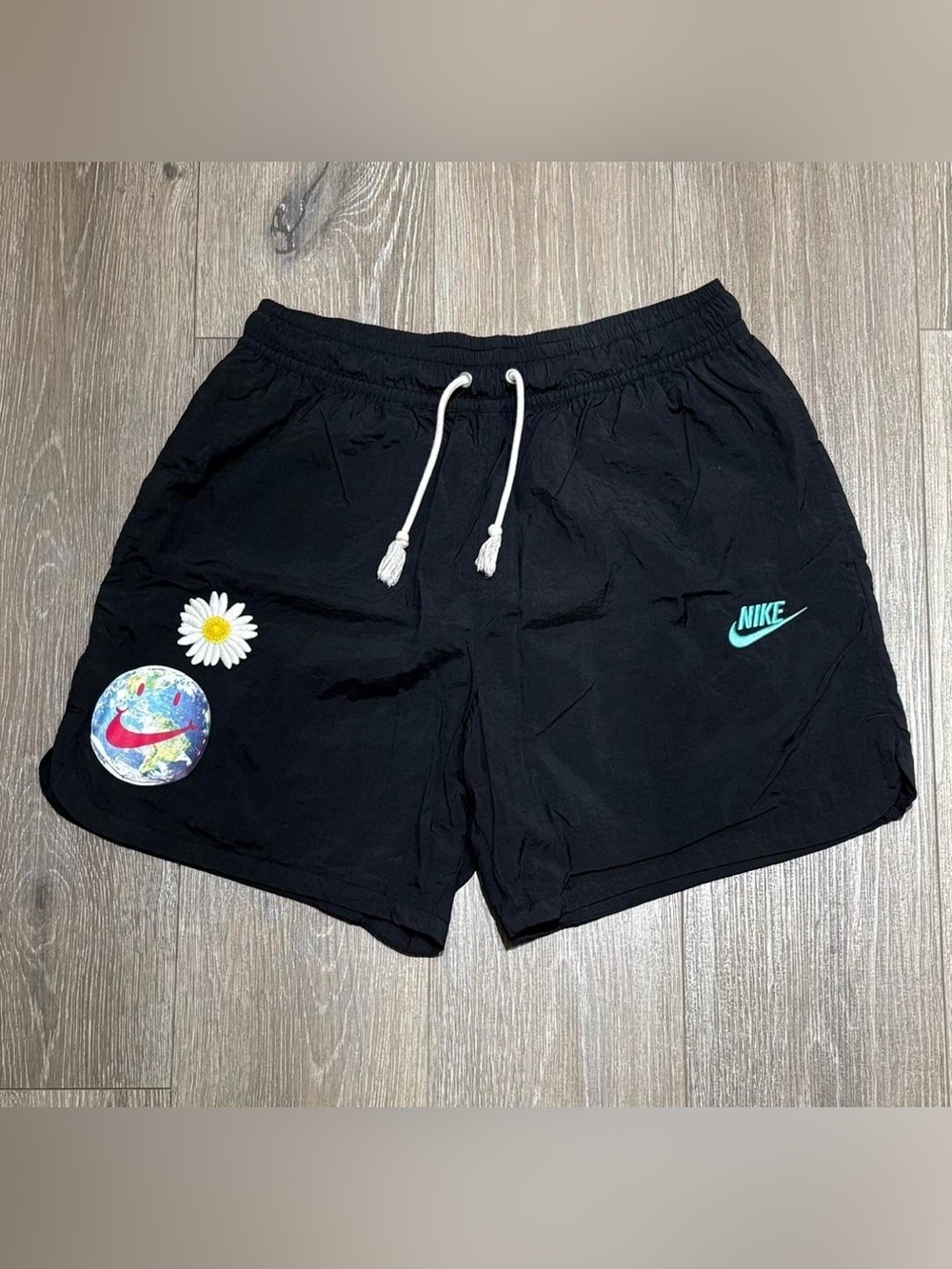Nike Black Shorts with Turquoise Logo and Daisy Patch